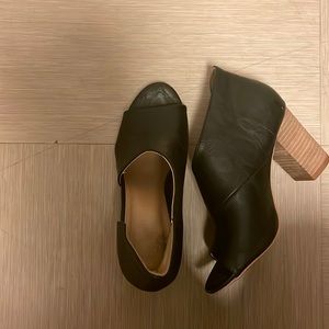 Black leather cutout block heels. Sized 6 1/2. Brand is Catherine Malandrino